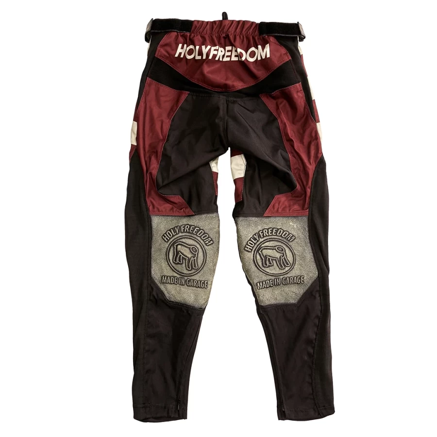 Front view of Mud Bordeaux technical off-road trousers in a rich bordeaux tone.