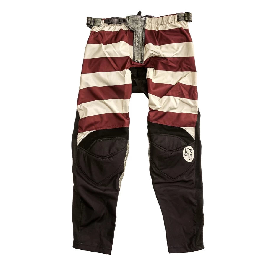Front view of Mud Bordeaux technical off-road trousers in a rich bordeaux tone.