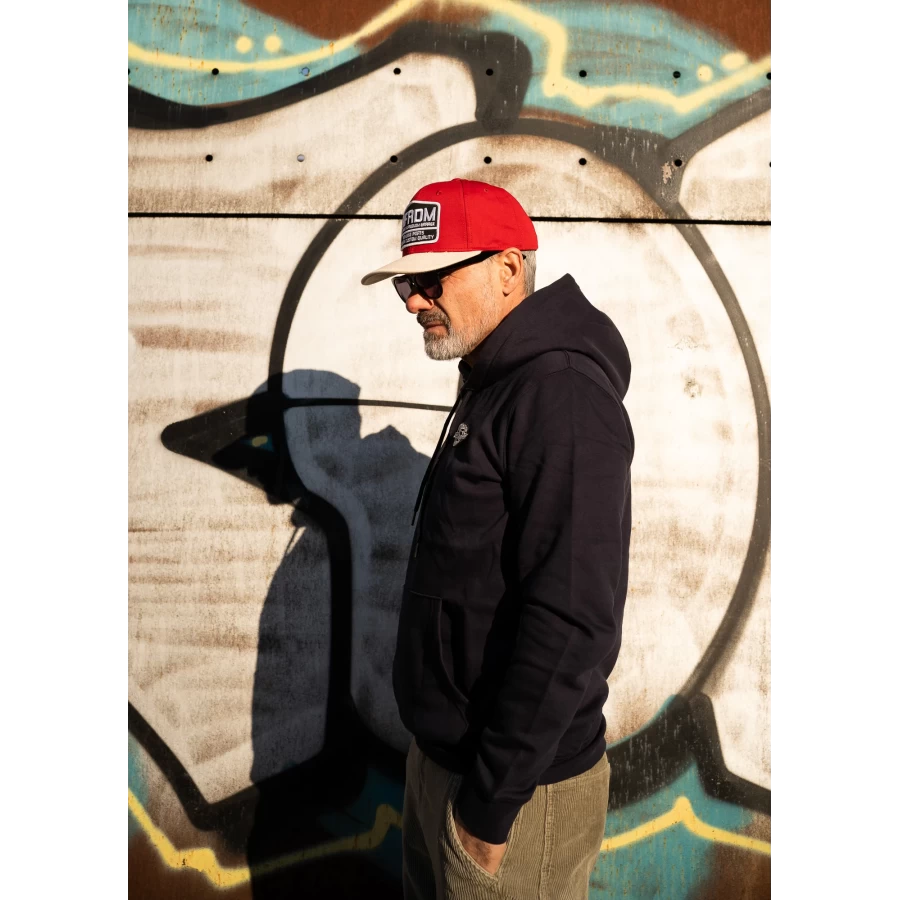 Detail of the navy Holyfreedom hoodie with a clean look and custom attitude.