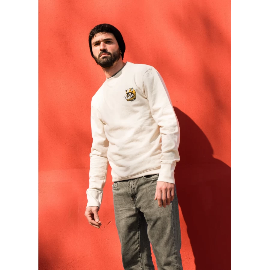 Biker lifestyle shot of the Holyfreedom crewneck sweatshirt, casual and retro.