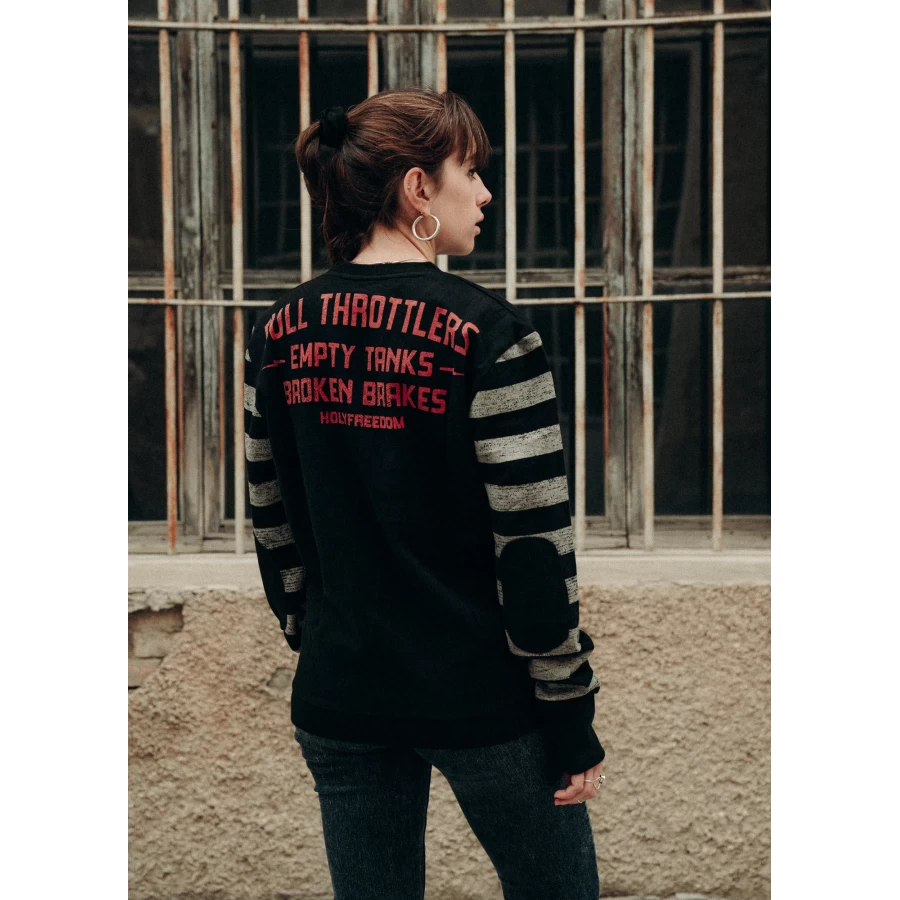Holyfreedom sweatshirt fit on a rider, ideal for relaxed custom style in the city.