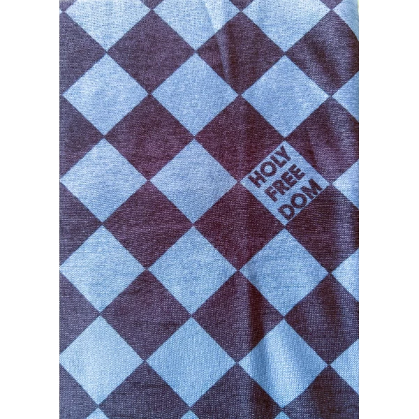 Close-up of the Sugar Bullit graphic on a warm technical motorcycle tube scarf