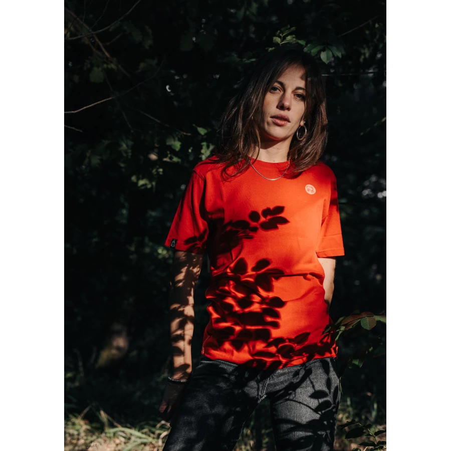 Graphic detail of the Holyfreedom Crew Red tee, with a clean biker look and vivid red tone.