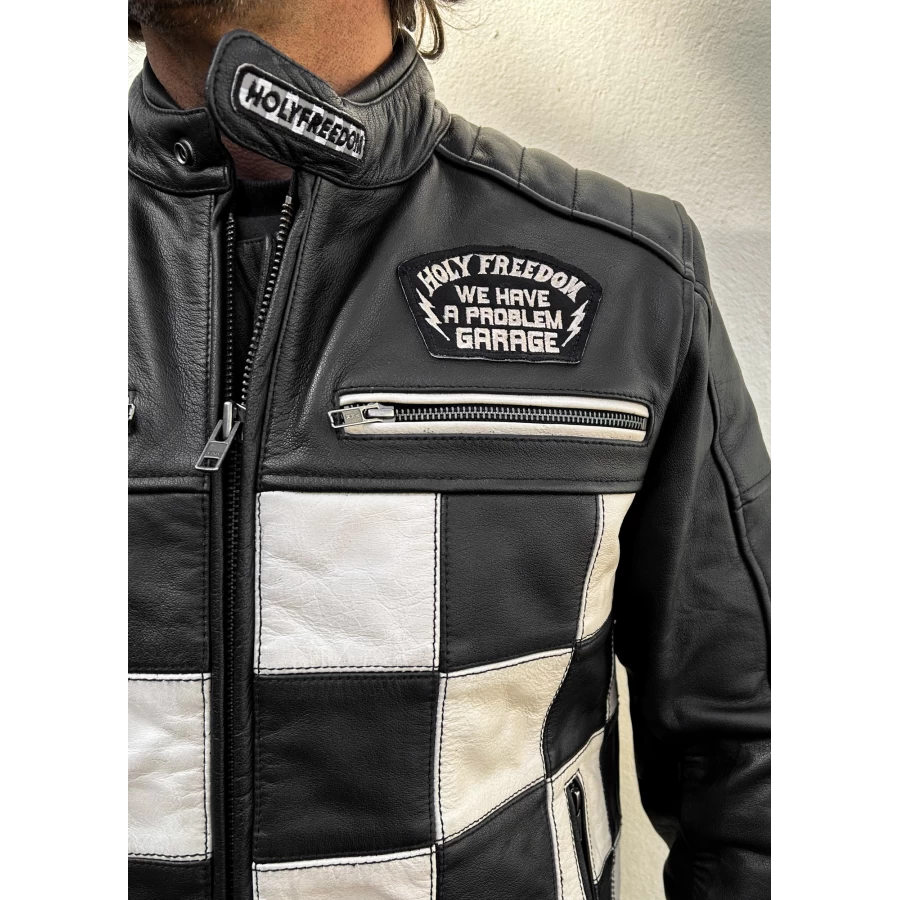Close detail of the leather finish and Holyfreedom trims on the CE jacket.
