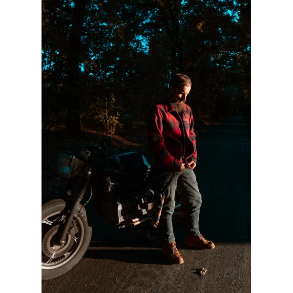 Fit and lifestyle image of the Holyfreedom flannel jacket worn for urban riding and daily wear.
