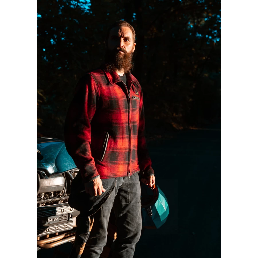 Fit and lifestyle image of the Holyfreedom flannel jacket worn for urban riding and daily wear.