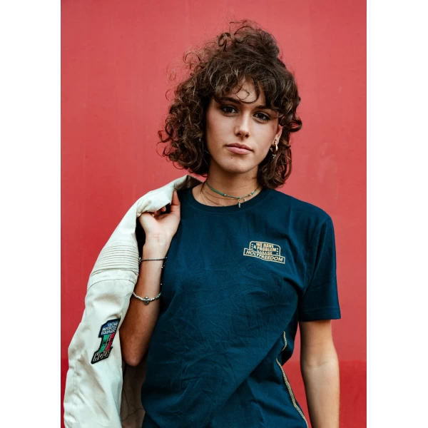 Graphic detail of the Holyfreedom Crew Blue tee, with a clean biker look and fresh blue tone.