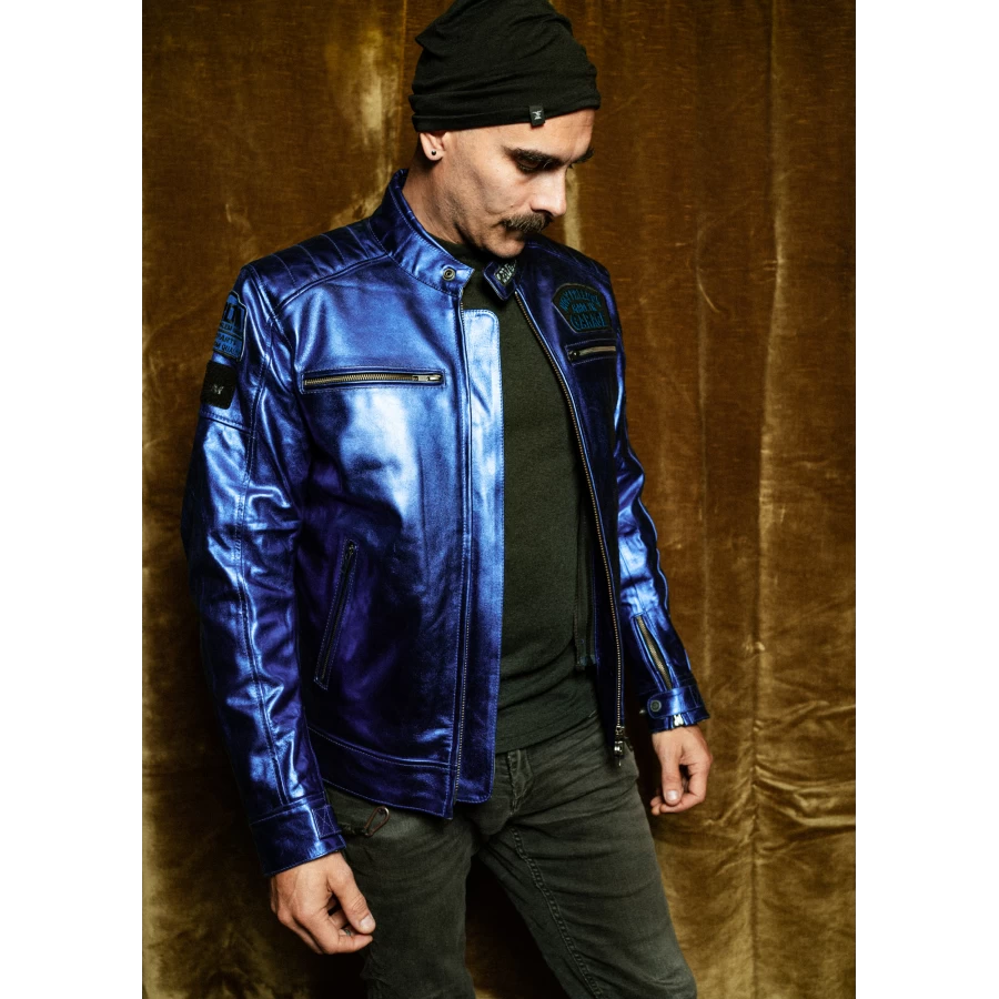 Worn on a custom motorcycle, the fitted Jacket Zero Metallic Blue blends Italian craft and rebellion.