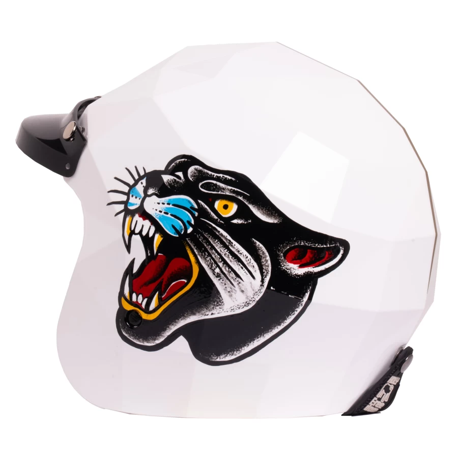 Close-up of the hand-painted Baghera graphic on a Holyfreedom helmet, bold and dynamic.