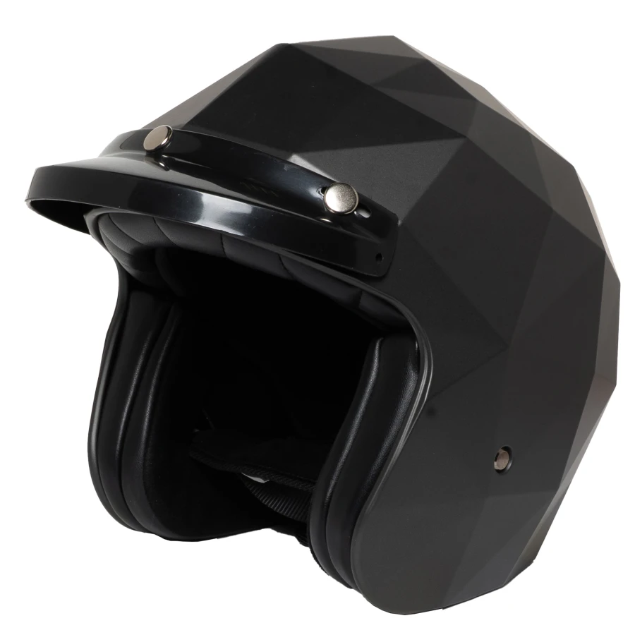Vista frontale della visiera Nera Mansell per casco moto vintage, profilo pulito.