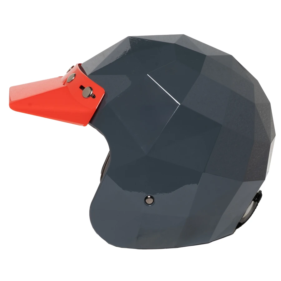 Graphic close-up of the red finish on the Rinaldi visor for a bold cafe racer look.