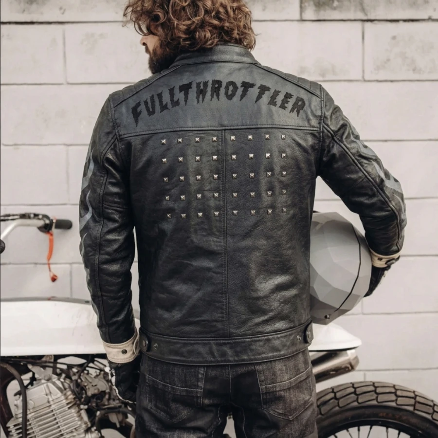 On-bike fit for an authentic vintage cafe racer leather jacket with dark attitude.