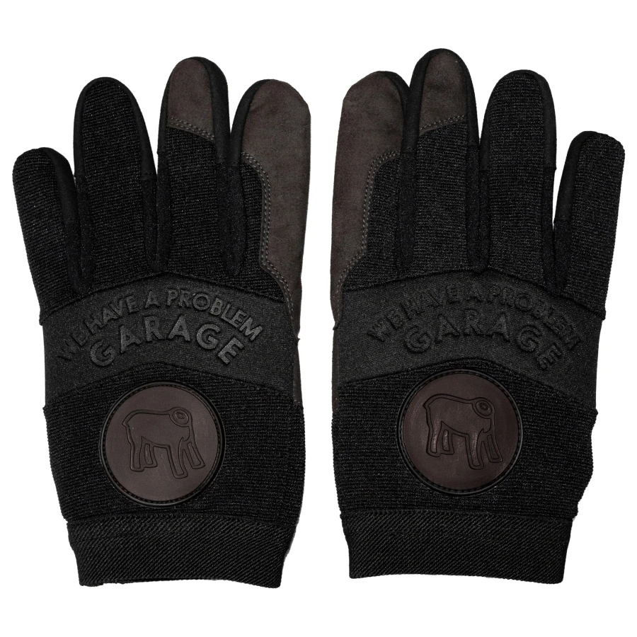 Gloves worn on a rider, bringing cafe racer attitude to city rides and weekend builds.