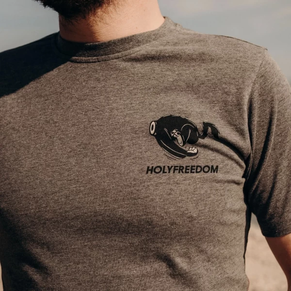 Graphic detail of the Be Careful tee, highlighting the subtle message and melange texture.