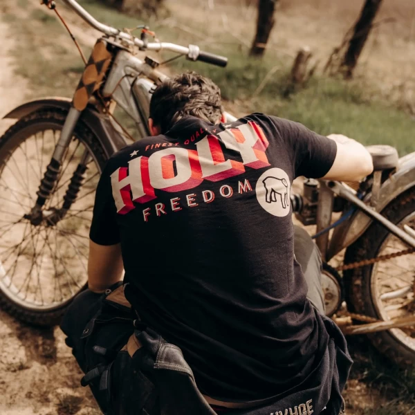 Relaxed fit for a vintage motorcycle t-shirt worn with jeans and a light jacket.