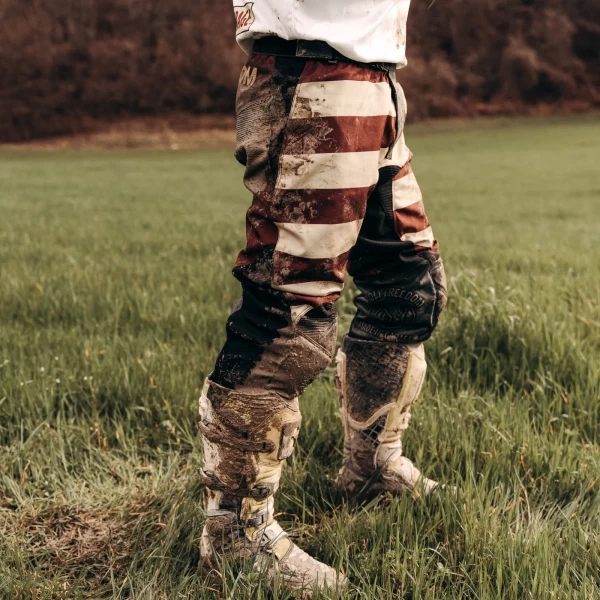 Mud Bordeaux trousers styled off-road with custom jacket and moto boots.