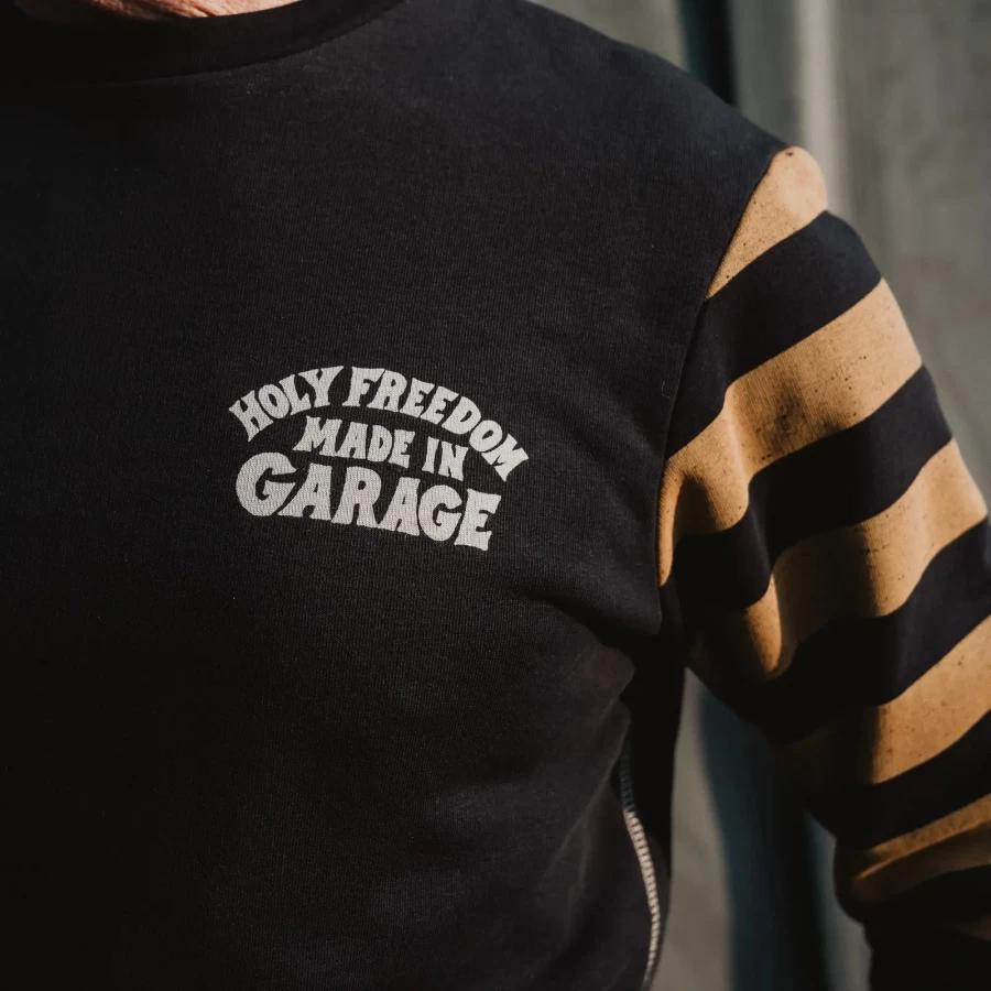 Close-up of the Clockwork original graphic on a custom sweatshirt with artistic detail.