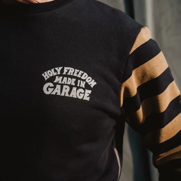 Close-up of the Clockwork original graphic on a custom sweatshirt with artistic detail.