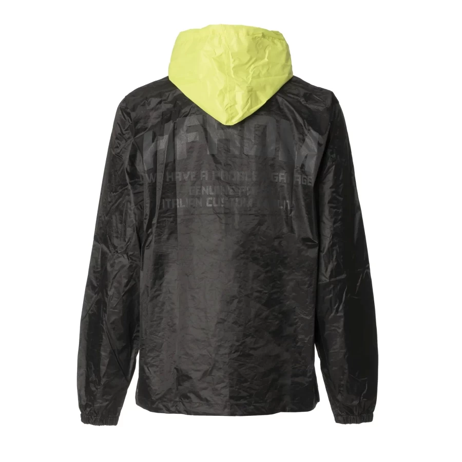 Vista frontale della giacca moto antipioggia Holyfreedom con finitura waxed e taglio urbano.