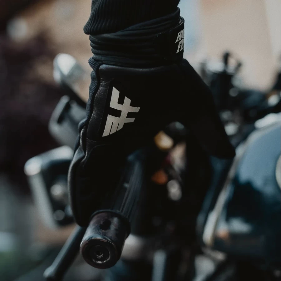 Close detail on stitching and leather grain, showing the handcrafted finish of Freedom Gloves.