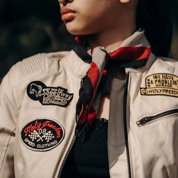 Graphic detail of the Holyfreedom Lupo scarf featuring original artwork and rebel style.