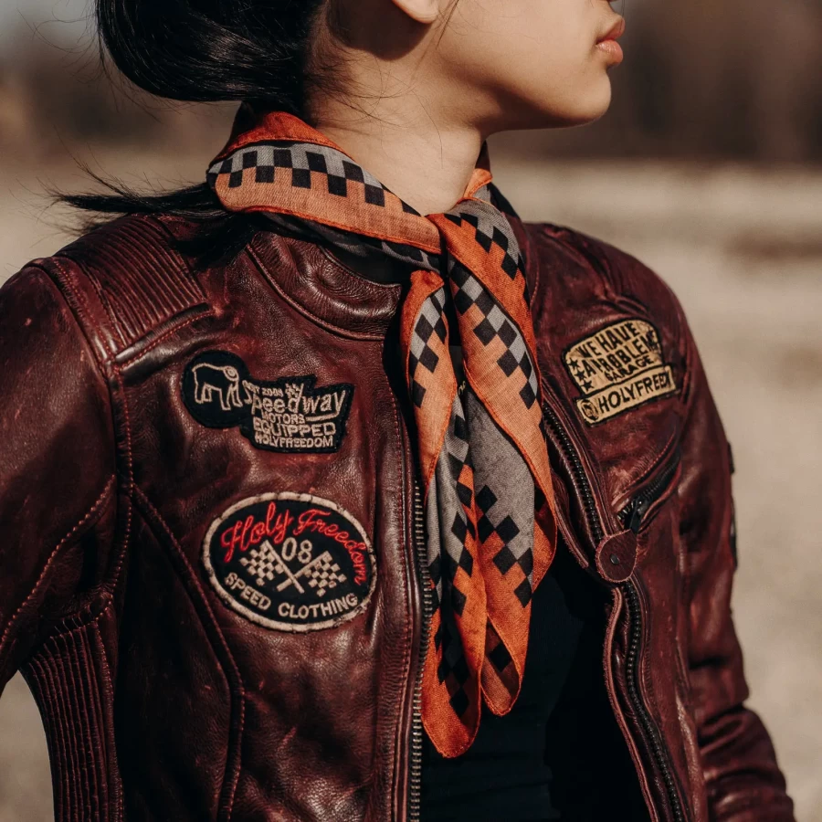 Custom motorcycle scarf worn in a street rider look, perfect with vintage helmet and cafe racer jacket.