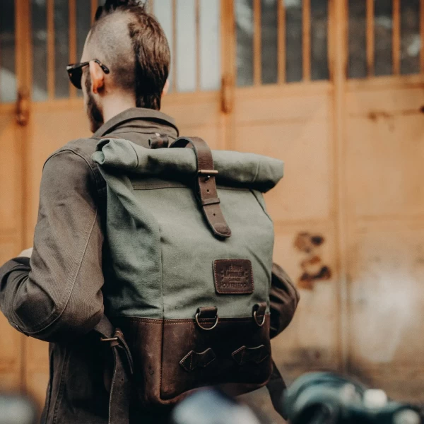 Bushcraft Green backpack worn in a custom motorcycle outfit for city rides and trips