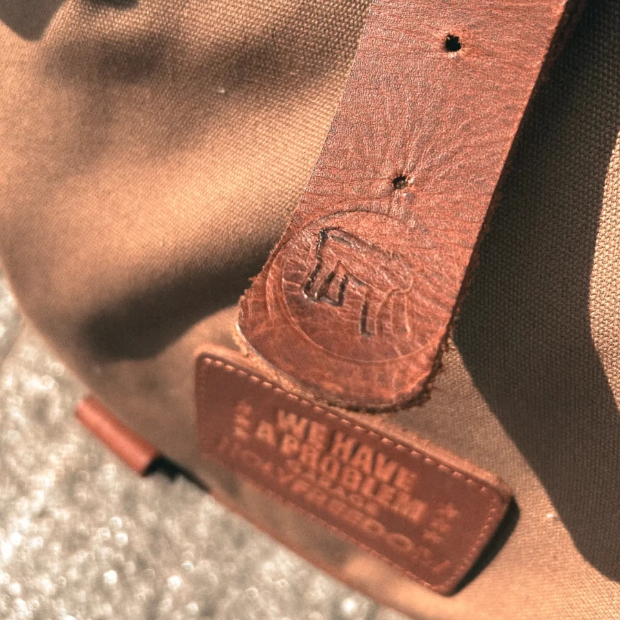 Detail of the backpack closure and motorcycle mounting system with straps or plate