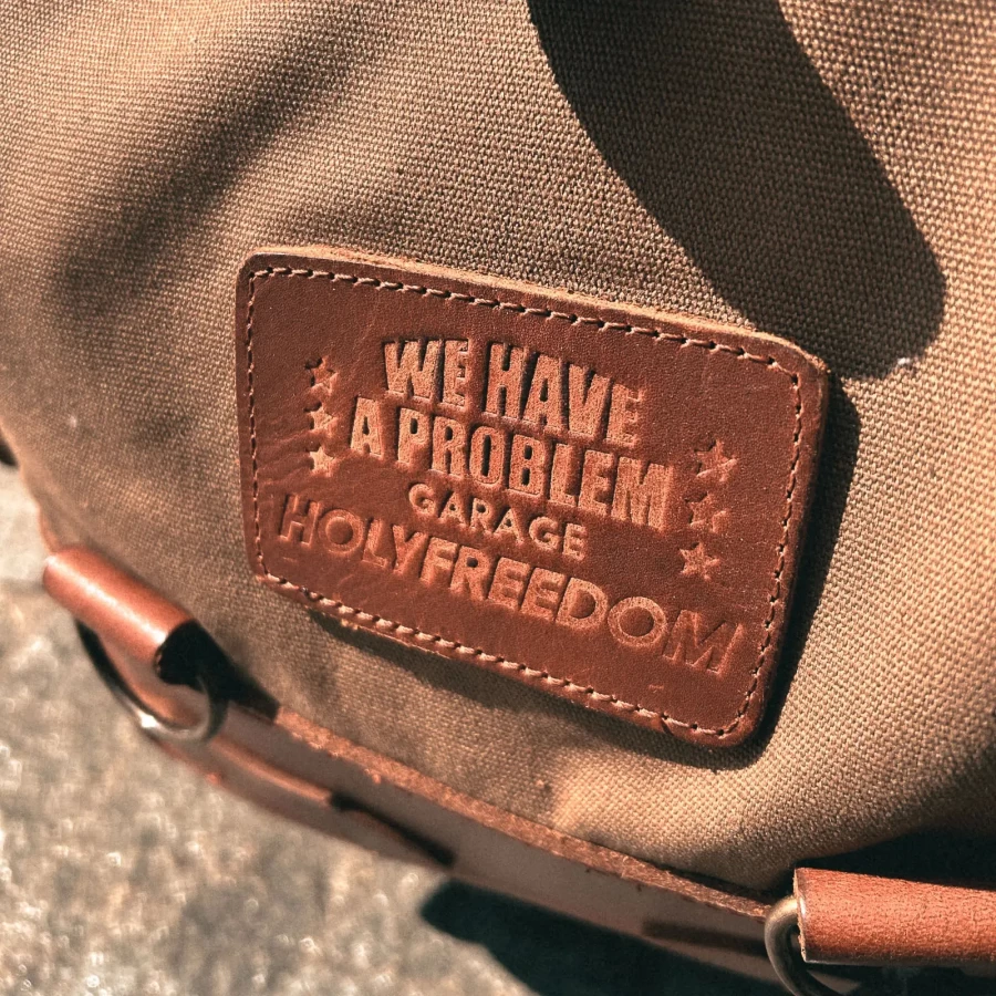 Detail of the backpack closure and motorcycle mounting system with straps or plate