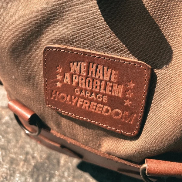 Detail of the backpack closure and motorcycle mounting system with straps or plate