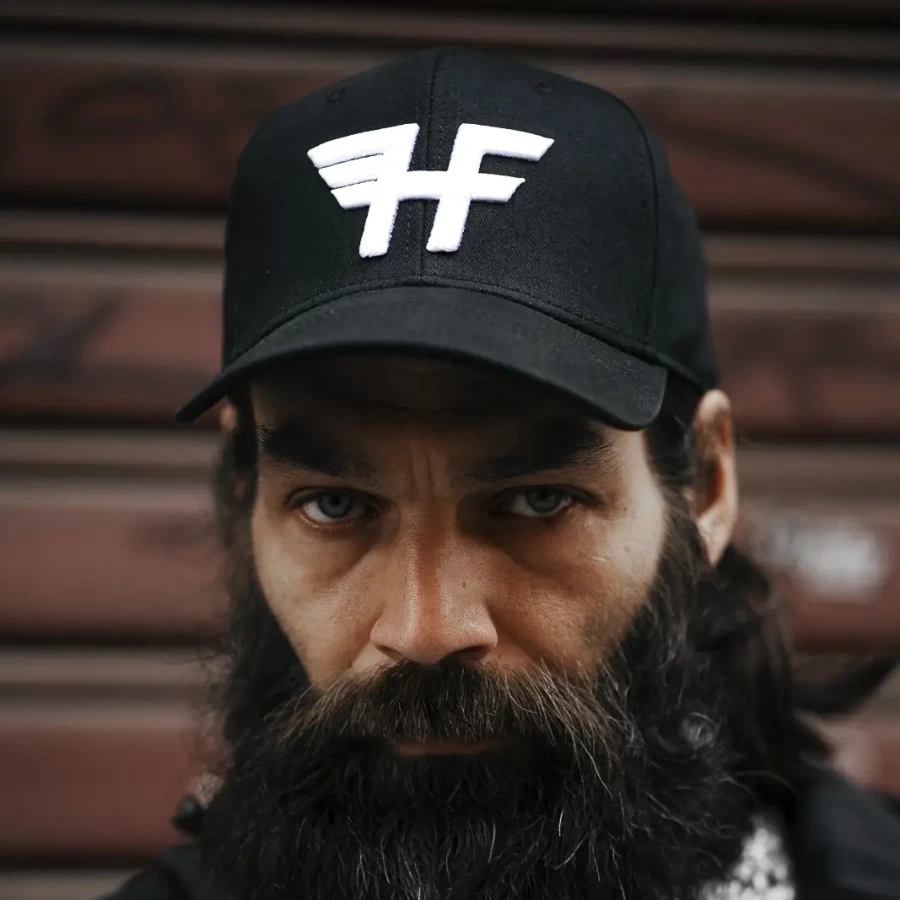 Close-up of the original Holyfreedom graphic on the cap, built for custom and cafe racer style.