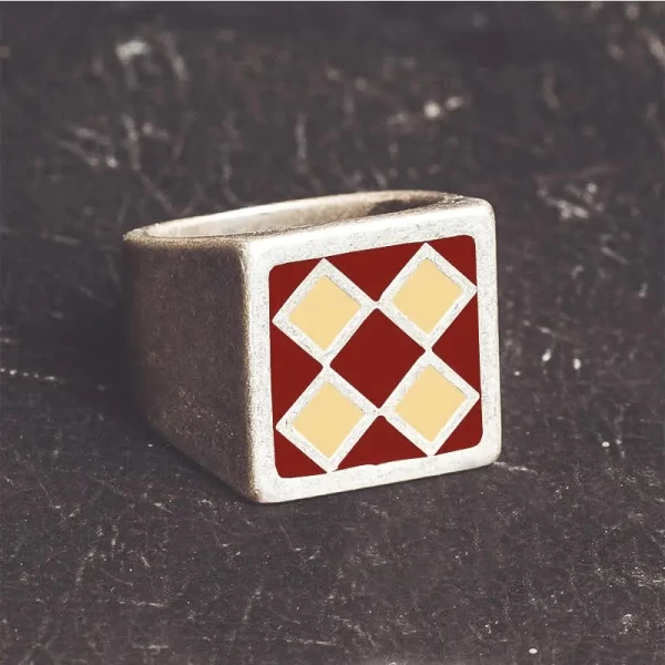 Front view of the Holyfreedom Bullit red beige ring with original artwork and vintage biker style.