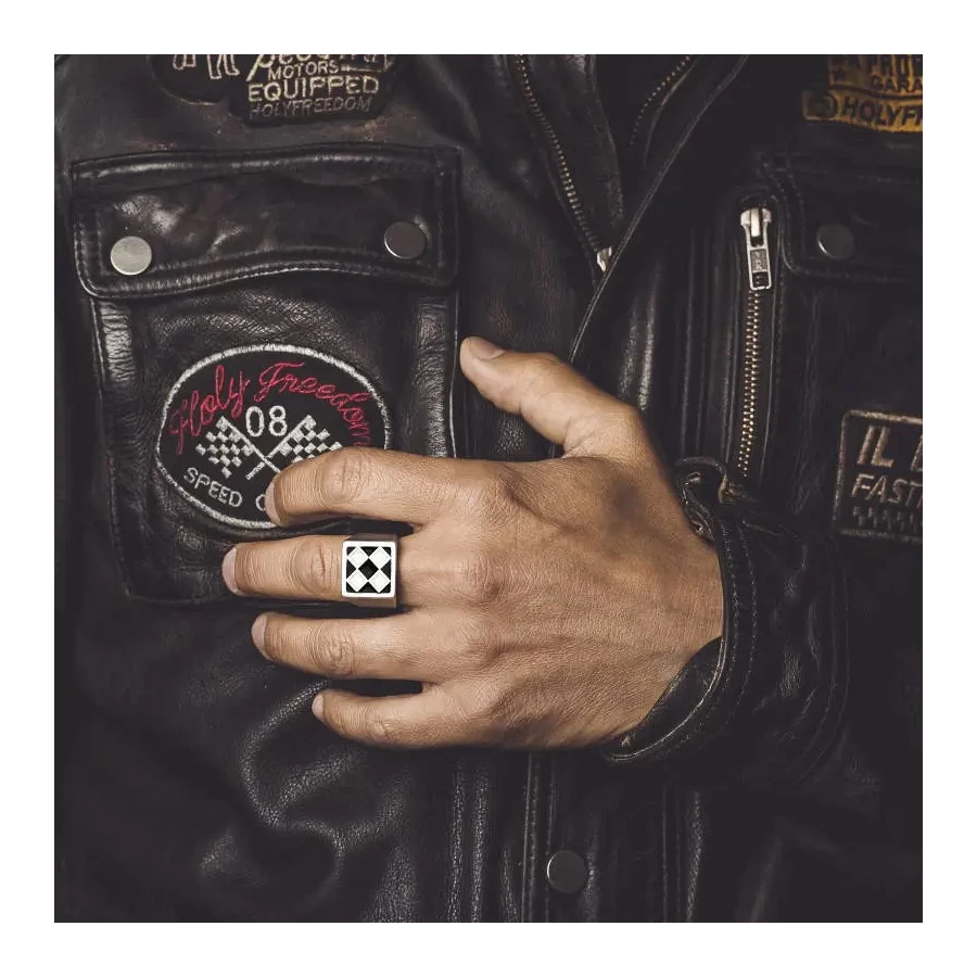 Bullit ring worn with a cafe racer outfit and vintage jacket for a rebellious touch.