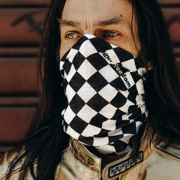 Fit and lifestyle shot showing the tube scarf worn under helmet for cold rides and daily use.