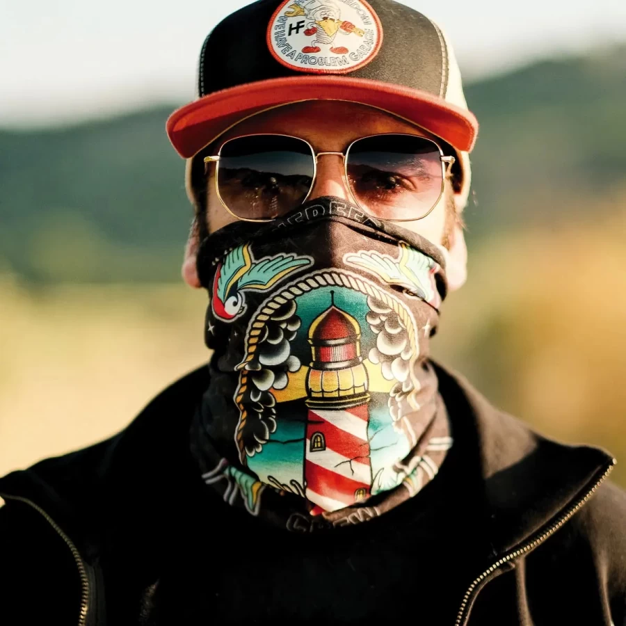 Tube scarf worn under the helmet, an easy summer motorcycle accessory for cafe racer riders.