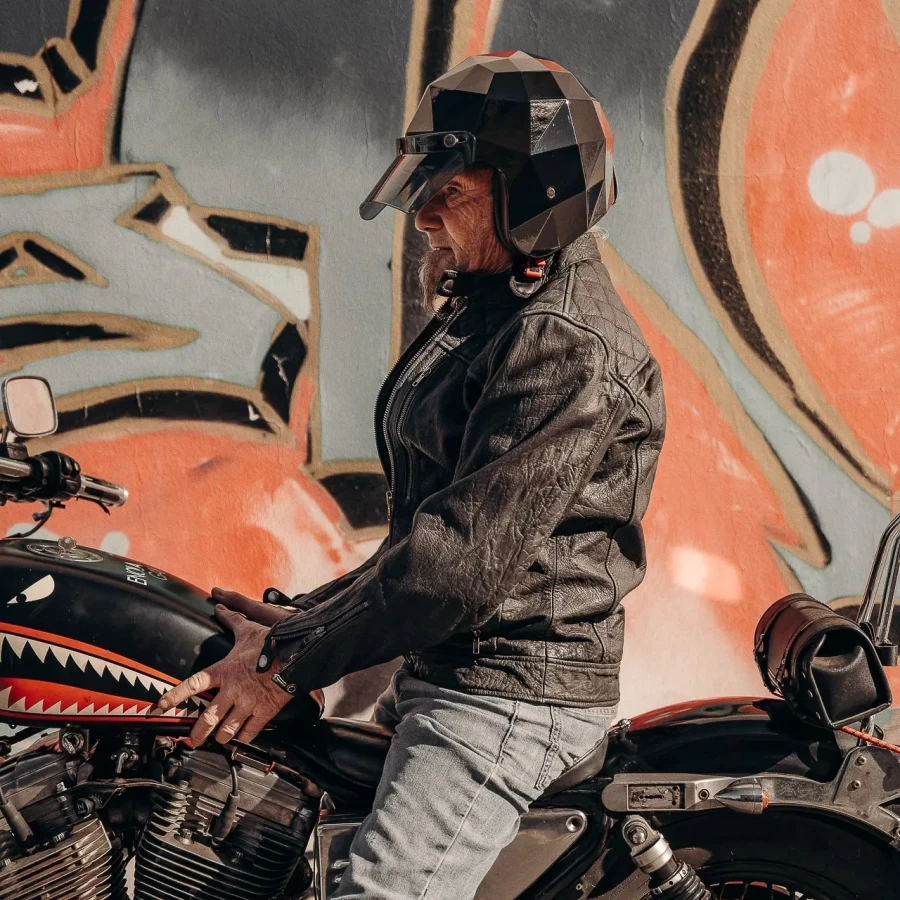 Holyfreedom Stealth glossy jet motorcycle helmet with faceted design and geodetic HF® shell.