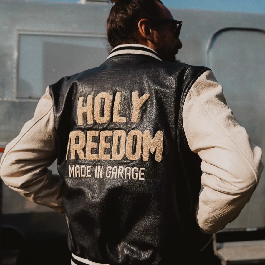 Detail of the varsity black jacket with clean lines and CE-ready riding features