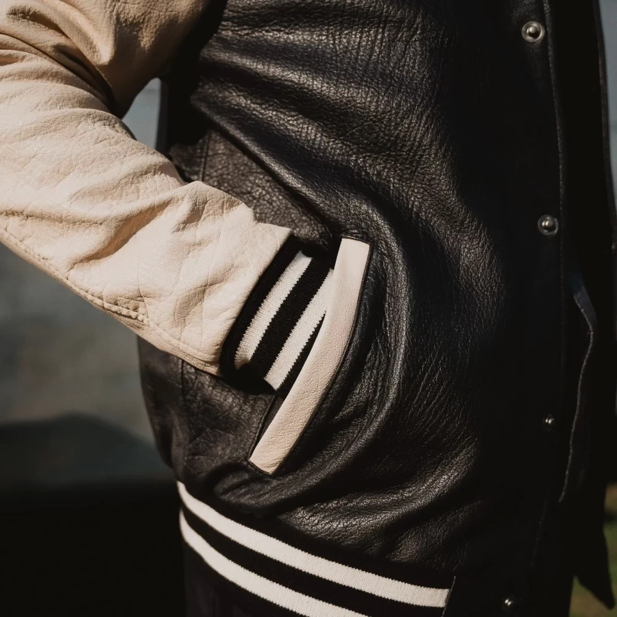 Detail of the varsity black jacket with clean lines and CE-ready riding features