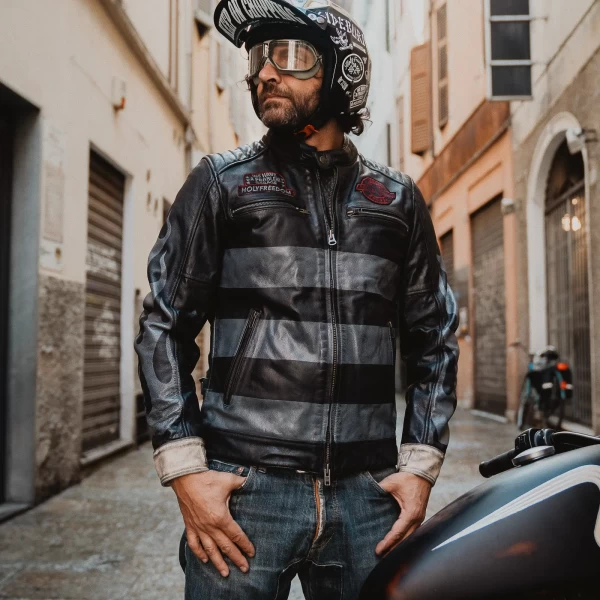 On-bike fit for an authentic vintage cafe racer leather jacket with dark attitude.