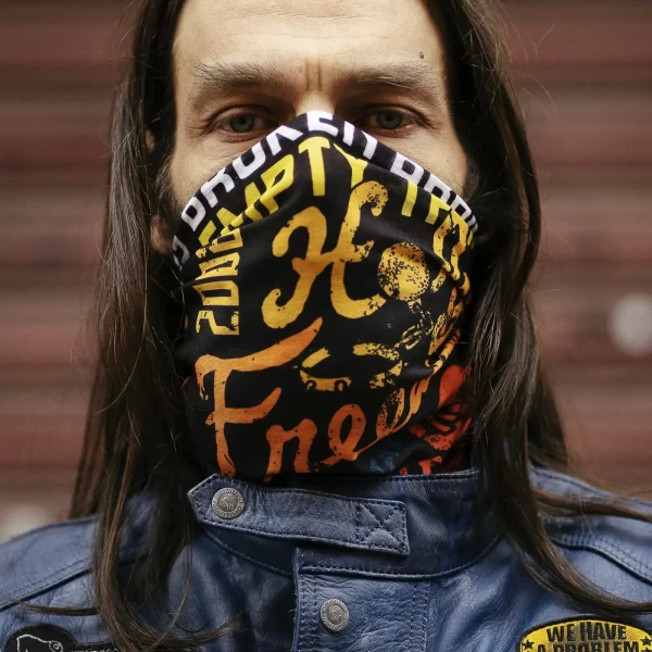 Graphic detail of the Flower Power multifunctional tube scarf with iconic Holyfreedom artwork.