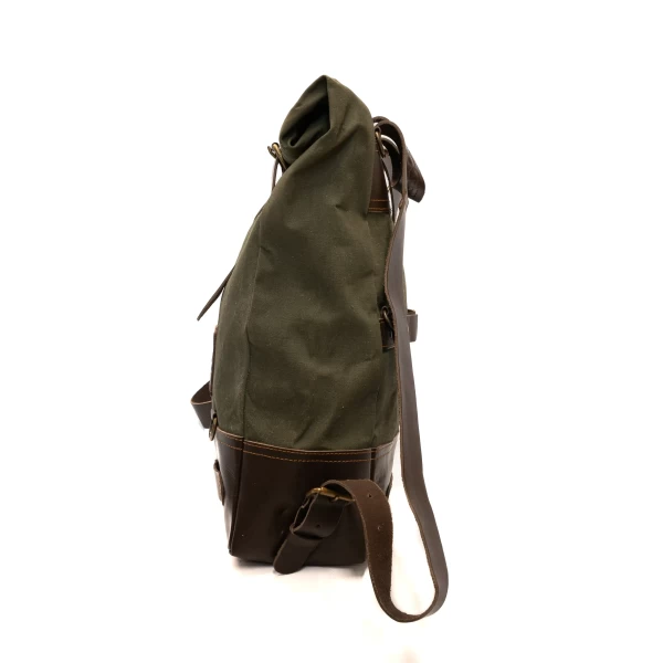 Front view of the Bushcraft Green roll-top motorcycle backpack with reinforced straps